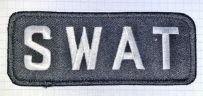 SWAT mærke sort med hvid tråd i broderi 11,5 x 4,5 cm