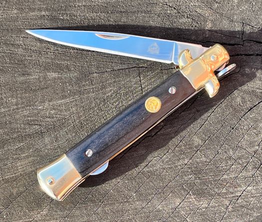 Puma Stiletto foldekniv med messingdetaljer og mørkt pakkawoodskæfte - jagtfoldekniv medici type